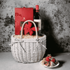 A Whirlwind Romance Gift Basket Tall White Wicker Basket, Chocolate Covered Strawberry, Truffles, and Bottle of Wine.