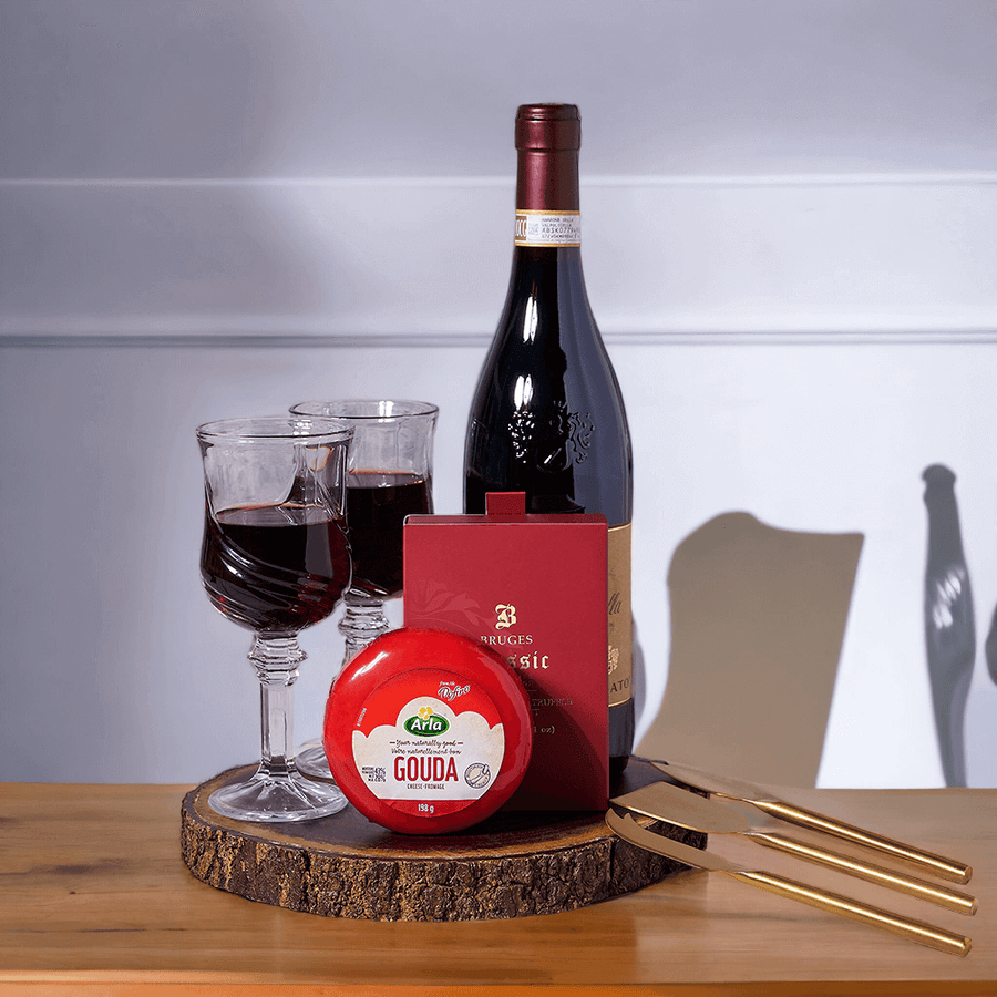 A Sparkling Romance Gift Set of  Bottle of Wine, Cheese, Chocolate,  Piece Rose Gold Charcuterie Set, 2 Fontana (Wine Glasses), and Live Edge Serving Board.   