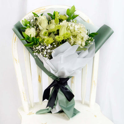 Blossoming Sunrise Mixed bouquet. Lilies, roses, hydrangea, and daisies along with baby's breath and ruscus in a floral wrap with designer ribbon. Mixed Floral Gifts from Monthly Sommelier USA - Same Day USA Delivery.