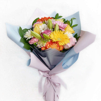Best of Spring and Summer! Caribbean Sunrise Mixed Floral Bouquet comes in refreshing colours.