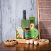This gift set features a bottle of sparkling wine, two champagne flutes, a handmade golf themed cookie, crackers, bar of chocolate, chocolate golf balls, Havarti with herbs & spices, tipsy jalapeno olives, and a wonderfully constructed sand trap cutting board and cheese knives set. 
